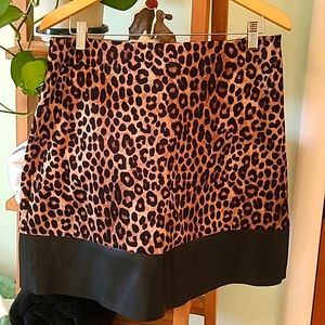 Fun leopard skirt with faux leather trim